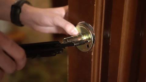 Professional locksmith at work in Delhi